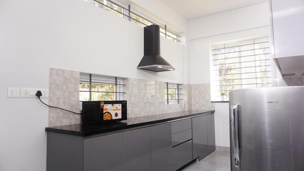 Dayone Suites Bangalore Esterno foto